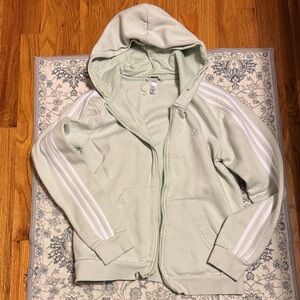 Light Green Hooded Jacket by Adidas. Size medium. Good condition.